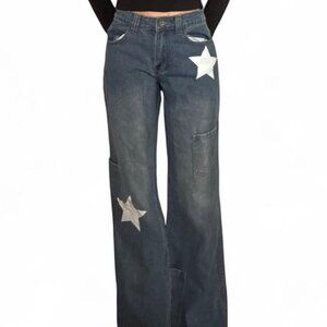 Blue denim jeans with star patches